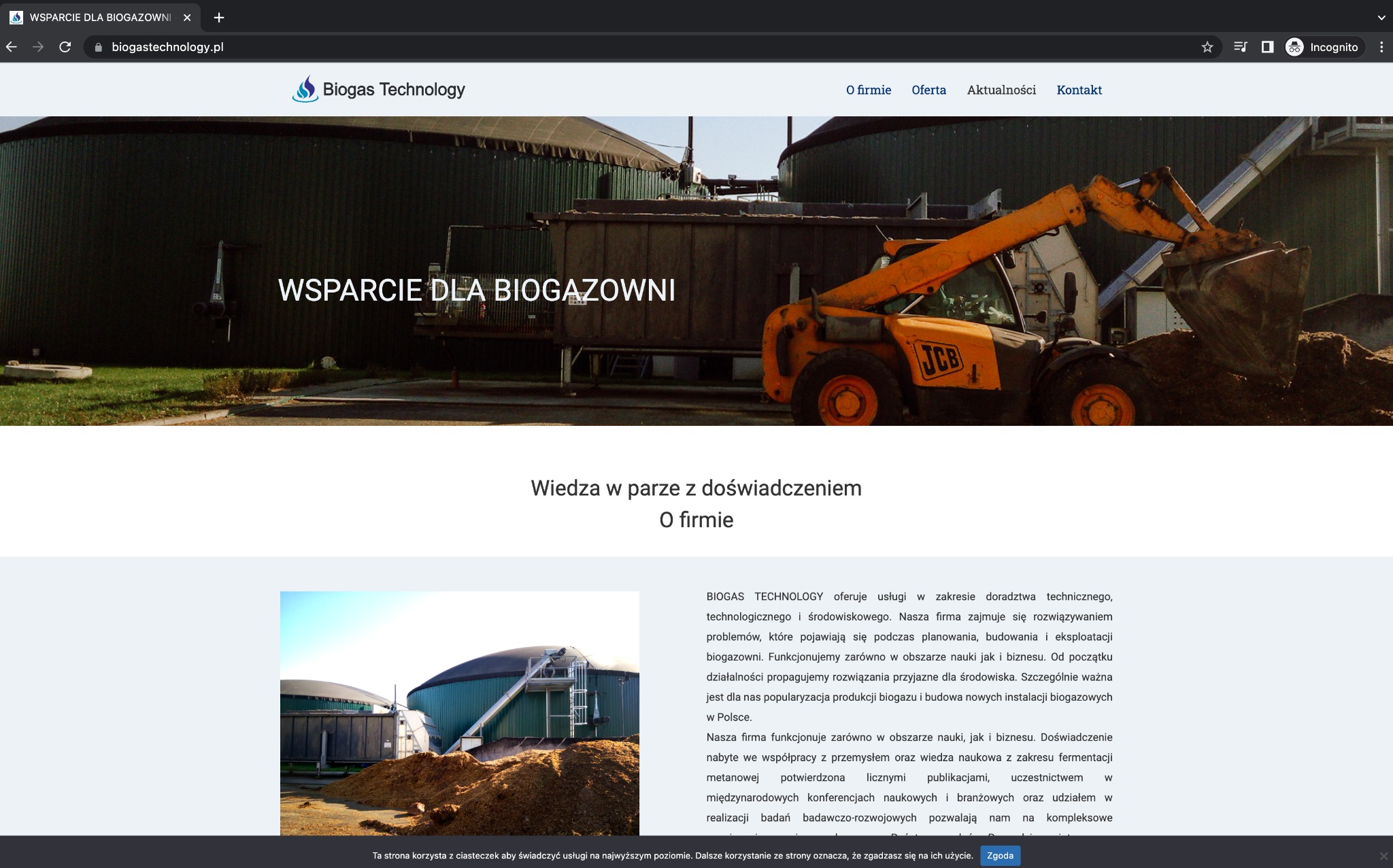 Strona internetowa firmy Biogas Technology, prezentująca wsparcie dla biogazowni; widoczny fragment strony z nagłówkiem, logo i zdjęciem ładowarki JCB przy biogazowni.