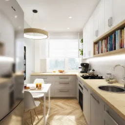 Jasna, nowoczesna kuchnia z szarymi szafkami, drewnianym blatem i podłogą w jodełkę. Na stole śniadanie: kawa, sok pomarańczowy i croissanty. Nad blatem półka z książkami.