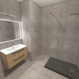 Nowoczesna łazienka z szarymi płytkami imitującymi kamień, drewnianą szafką pod umywalką z białym blatem, podświetlanym lustrem i kabiną prysznicową typu walk-in z czarnym brodzikiem.