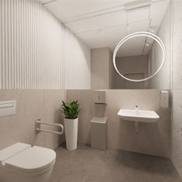 Projektownia Aleksandra Pietrzak - Beżowa łazienka z toaletą, umywalką i okrągłym lustrem z podświetleniem LED, wykończona płytkami imitującymi kamień.