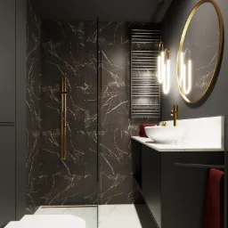 Nowoczesna łazienka z kabiną prysznicową wykończoną płytkami imitującymi czarny marmur ze złotymi żyłami, wisząca szafka z umywalką, okrągłe lustro z podświetleniem LED i grzejnik drabinkowy.