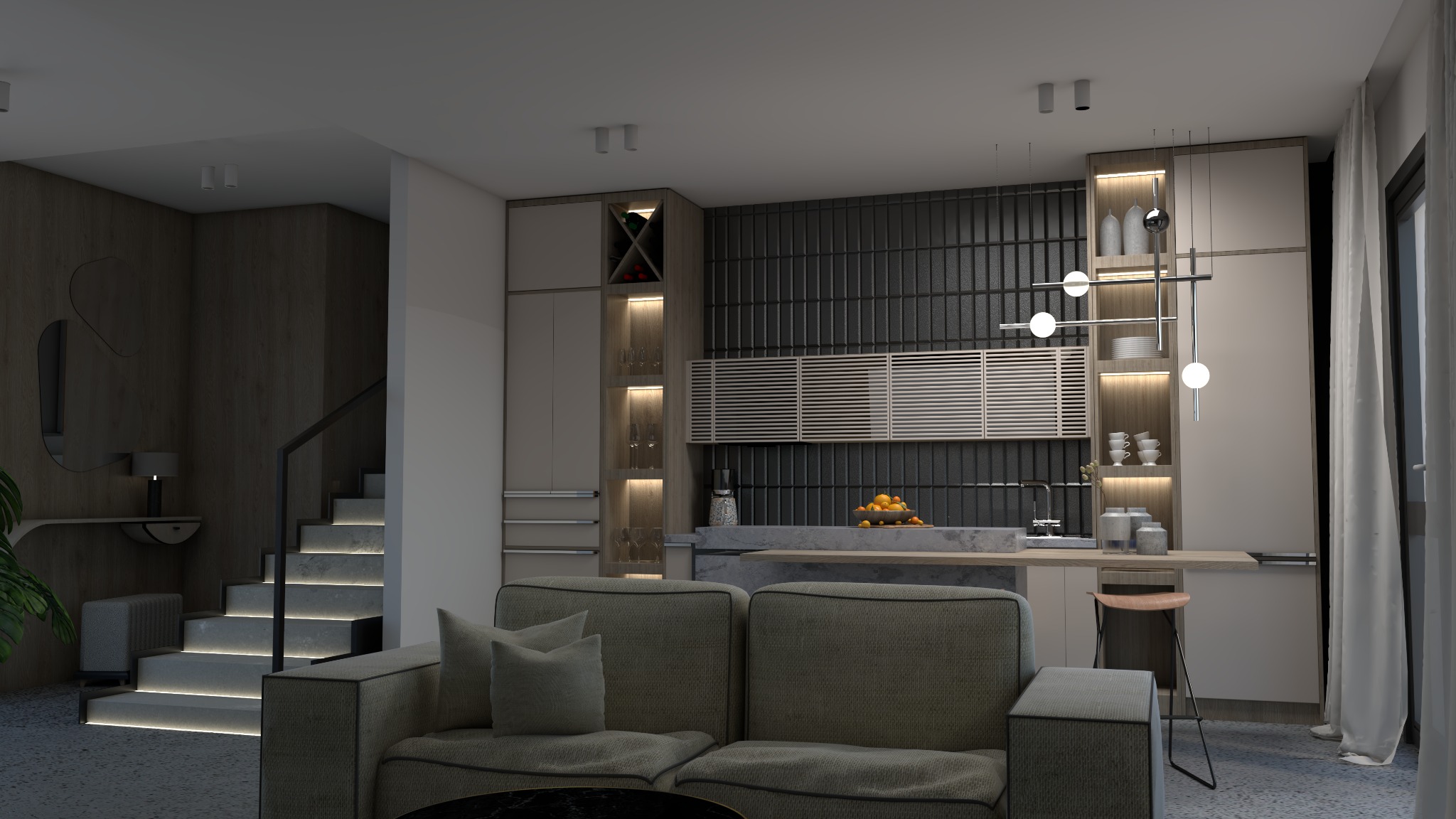 Nowoczesne wnętrze salonu we Wrocławiu z otwartą kuchnią, szara sofa na pierwszym planie, w tle schody z podświetleniem LED i zabudowa kuchenna z czarnymi płytkami na ścianie.