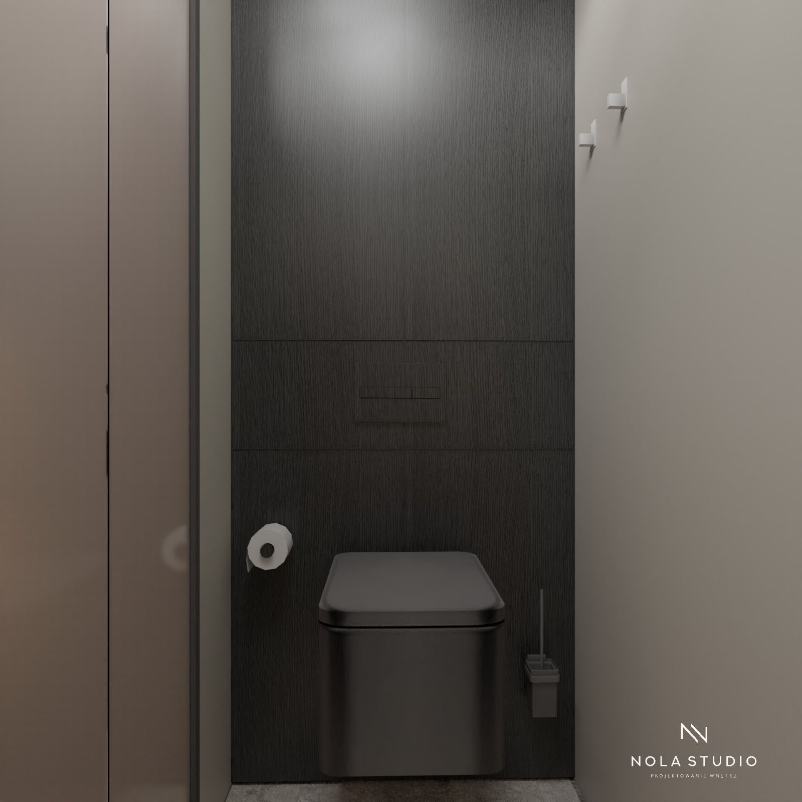 Minimalistyczna toaleta w odcieniach szarości z ukrytą spłuczką, papierem toaletowym po lewej i szczotką do WC po prawej, oświetlona punktowo, z widocznym logo Nola Studio.