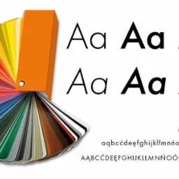 Paleta kolorów Pantone obok przykładów czcionek z polskimi znakami diakrytycznymi i cyframi.