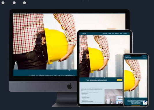 Responsywna strona internetowa safety.pl prezentowana na monitorze, tablecie i smartfonie; w tle widać fragment osoby trzymającej żółty kask budowlany.