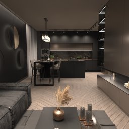 Mastmi Design - Łukasz Maślankowski - Nowoczesne wnętrze mieszkania z ciemną kolorystyką, obejmujące salon z szarą sofą i stolikiem kawowym, otwartą kuchnię z wyspą i barkiem, oraz dekoracyjne oświetlenie punktowe i panele ścienne...