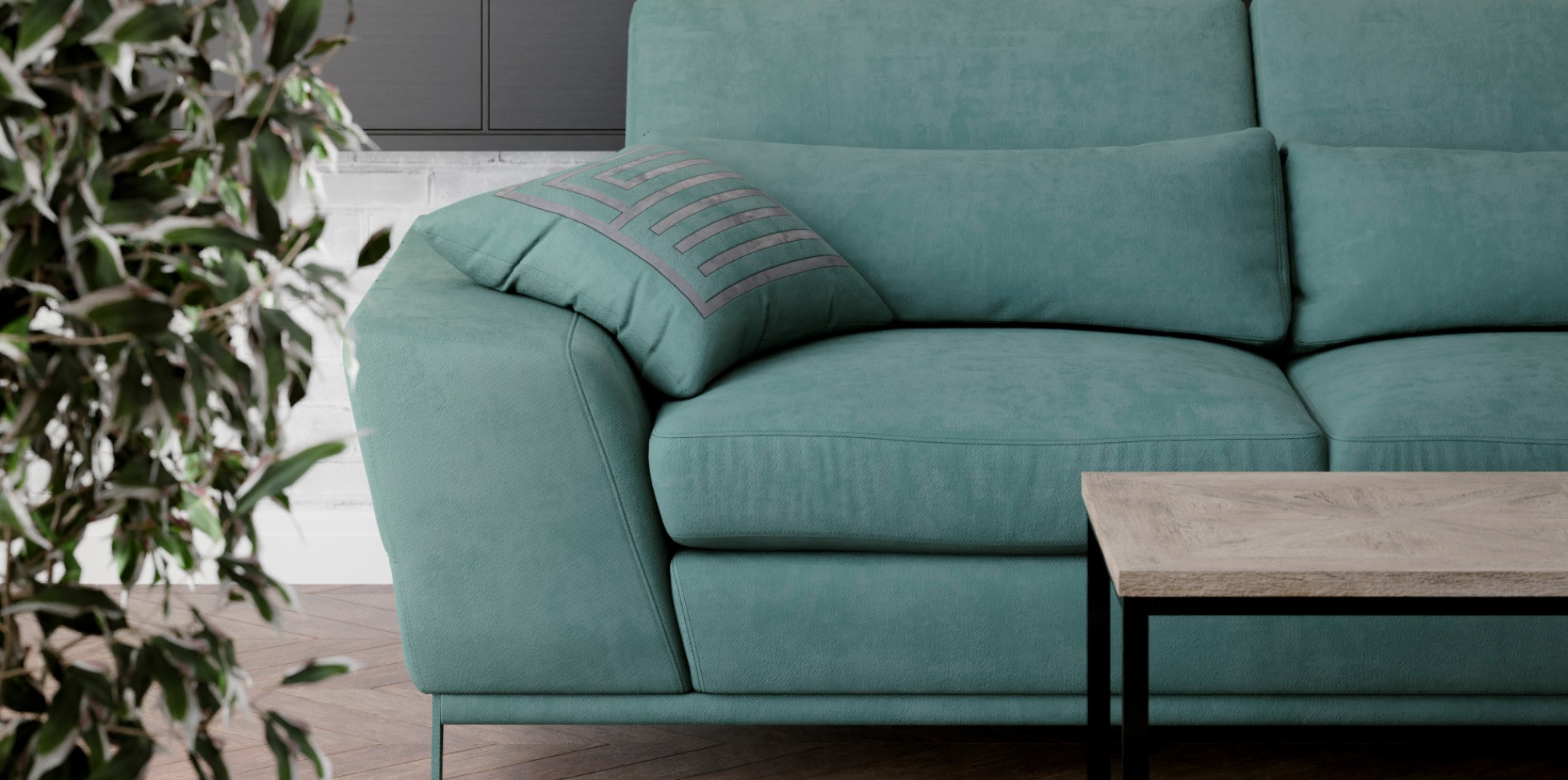 Turkusowa sofa z poduszką w geometryczny wzór i drewnianym stolikiem kawowym w Zielonej Górze, uzupełniona zieloną rośliną doniczkową i elementami dekoracyjnymi w tle.