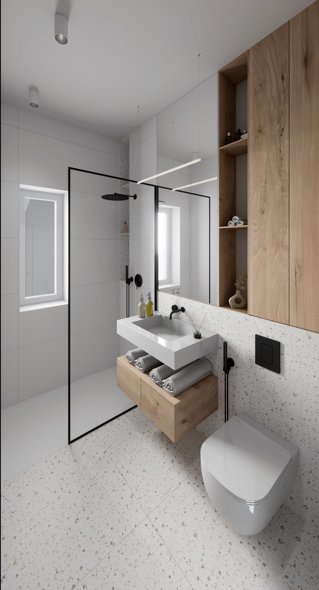 Nowoczesna łazienka z kabiną prysznicową typu walk-in, umywalką nablatową na drewnianej szafce, wiszącą toaletą i płytkami lastryko na podłodze i ścianie.