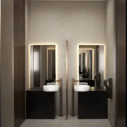 Wizualizacja nowoczesnej łazienki publicznej z dwoma umywalkami nablatowymi na czarnych, marmurowych szafkach, podświetlanymi lustrami i dyskretnymi suszarkami do rąk.