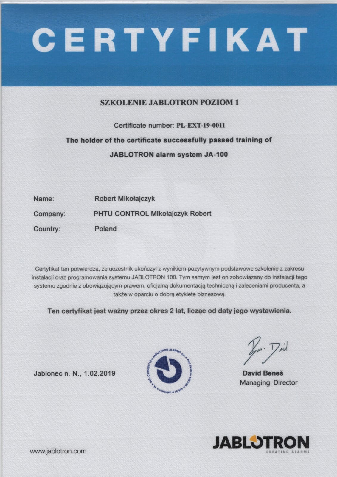 Skan certyfikatu ukończenia szkolenia Jablotron Poziom 1 dla Roberta Mikołajczyka, potwierdzającego umiejętności instalacji i programowania systemu alarmowego JA-100.