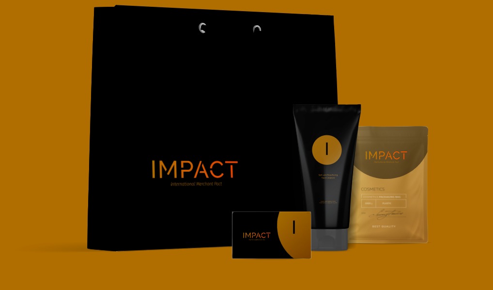 Czarna torba prezentowa, tuba kosmetyczna, saszetka i wizytówka z gradientem i logo 'IMPACT' na pomarańczowym tle.
