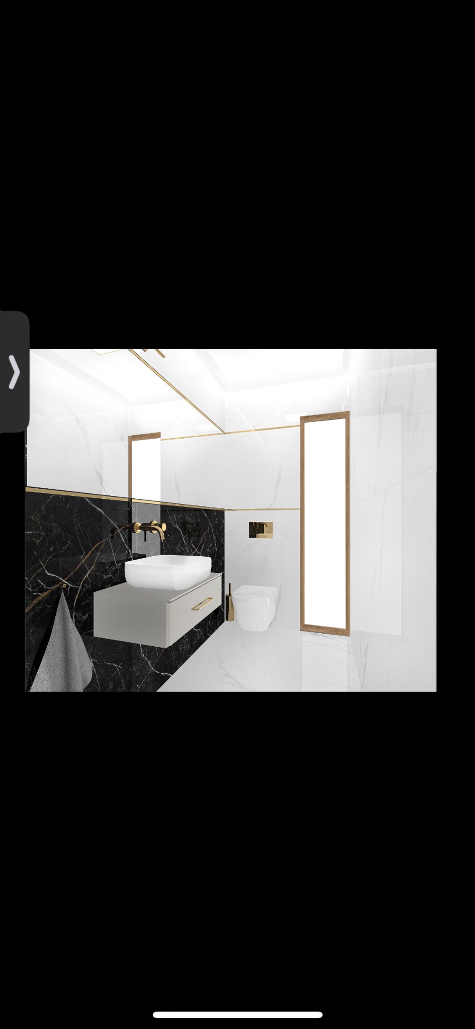 Nowoczesna łazienka z czarno-białymi marmurowymi płytkami, wiszącą szafką z umywalką, złotą armaturą i lustrem w drewnianej ramie.