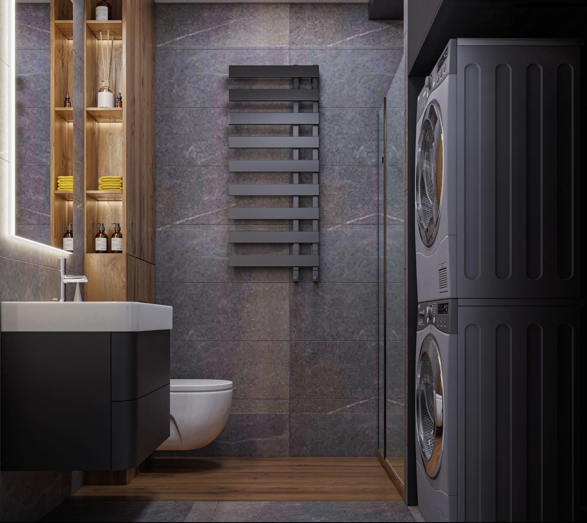 Nowoczesna łazienka z szarymi płytkami imitującymi kamień, wiszącą szafką z umywalką, podświetlaną półką z drewnianymi akcentami, grzejnikiem drabinkowym i pralko-suszarką w zabudowie.