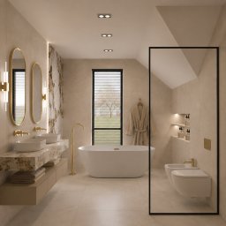 HouseOfDesign - Nowoczesna łazienka w beżach ze złotymi akcentami: podwójna umywalka na marmurowym blacie, owalne lustra, wolnostojąca wanna, toaleta i bidet. Okno z żaluzjami i podświetlana wnęka.