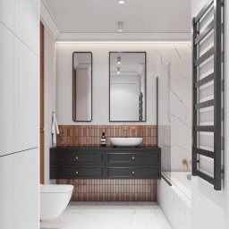 MOIA studio - Nowoczesna łazienka z marmurową podłogą i ścianami, czarna szafka pod umywalką z złotymi gałkami, dwa prostokątne lustra i grzejnik drabinkowy w kolorze grafitowym.