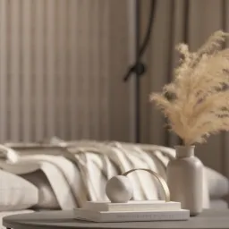 Beżowa kompozycja dekoracyjna na stoliku kawowym: pampas w wazonie, książki z napisem 'Photography Journal', ceramiczna kula i złoty łuk, w tle łóżko z narzutą i lamelowa ściana.