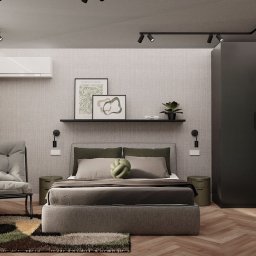 Sypialnia w czteropokojowym mieszkaniu w stylu Dark Nordic z elementami zieleni. 
