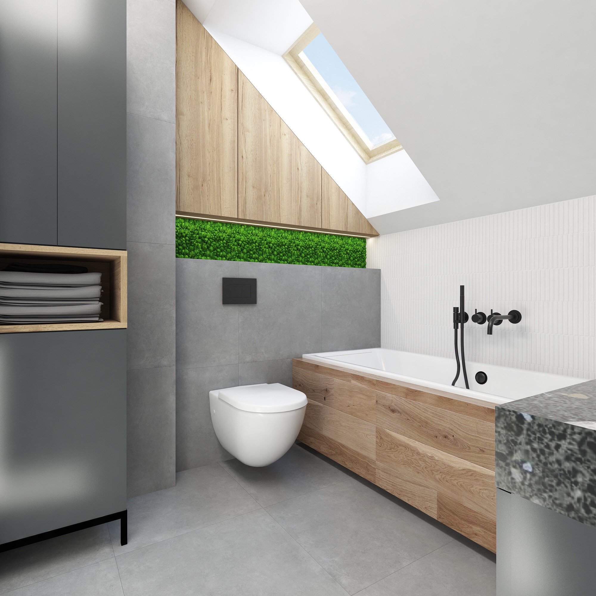Nowoczesna łazienka na poddaszu z drewnianą obudową wanny, szarą zabudową meblową i toaletą podtynkową, akcentem zieleni w postaci panelu z mchu oraz oknem dachowym.