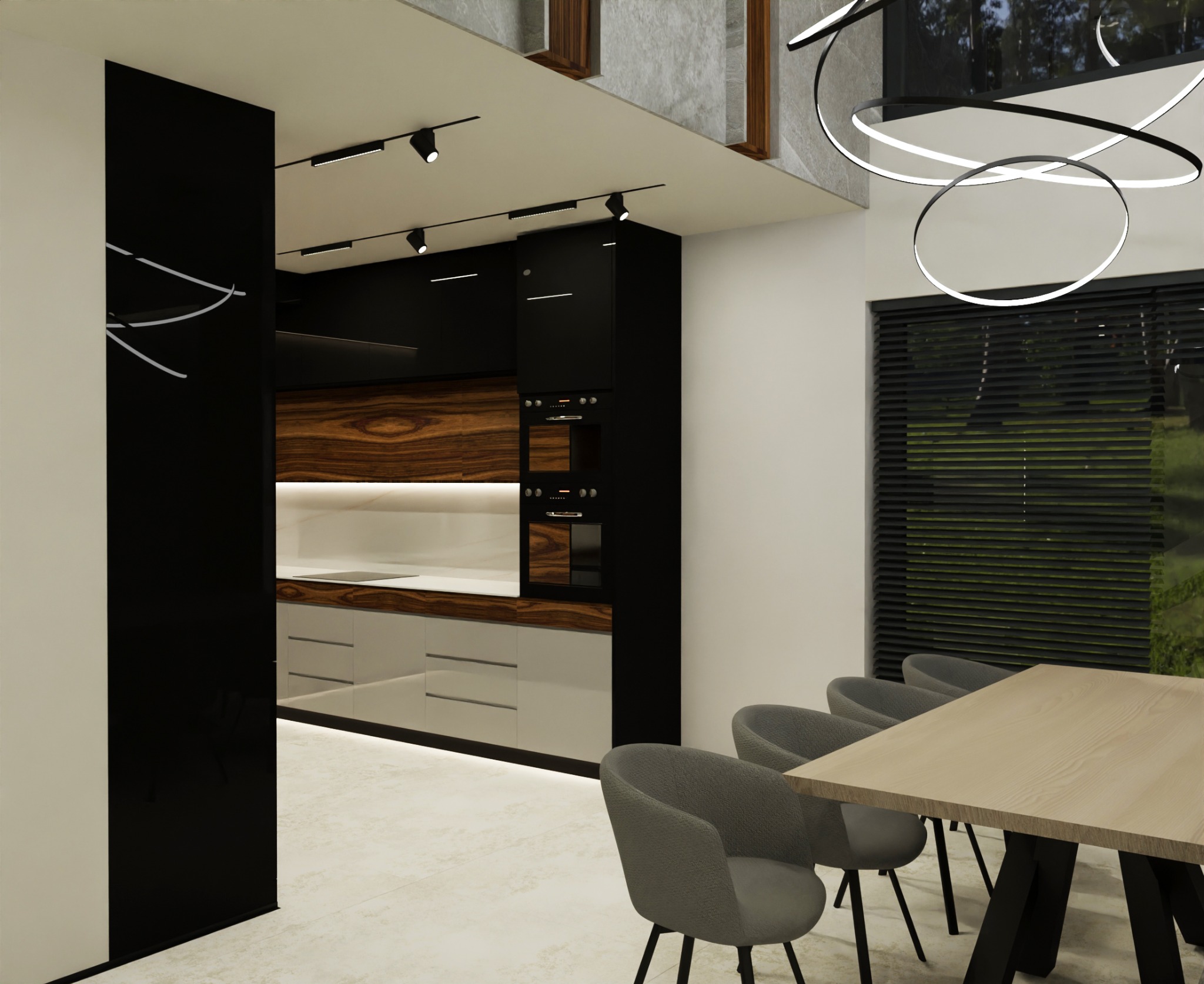 Nowoczesna kuchnia z drewnianymi akcentami, czarnymi szafkami i designerską lampą wiszącą nad stołem jadalnym z szarymi krzesłami.