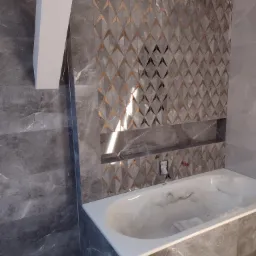 Wykończona łazienka z wanną obudowaną szarymi płytkami imitującymi marmur i ścianą z dekoracyjnymi płytkami w geometryczny wzór z akcentami w kolorze złota, wnęka w ścianie wykończona tymi samymi...