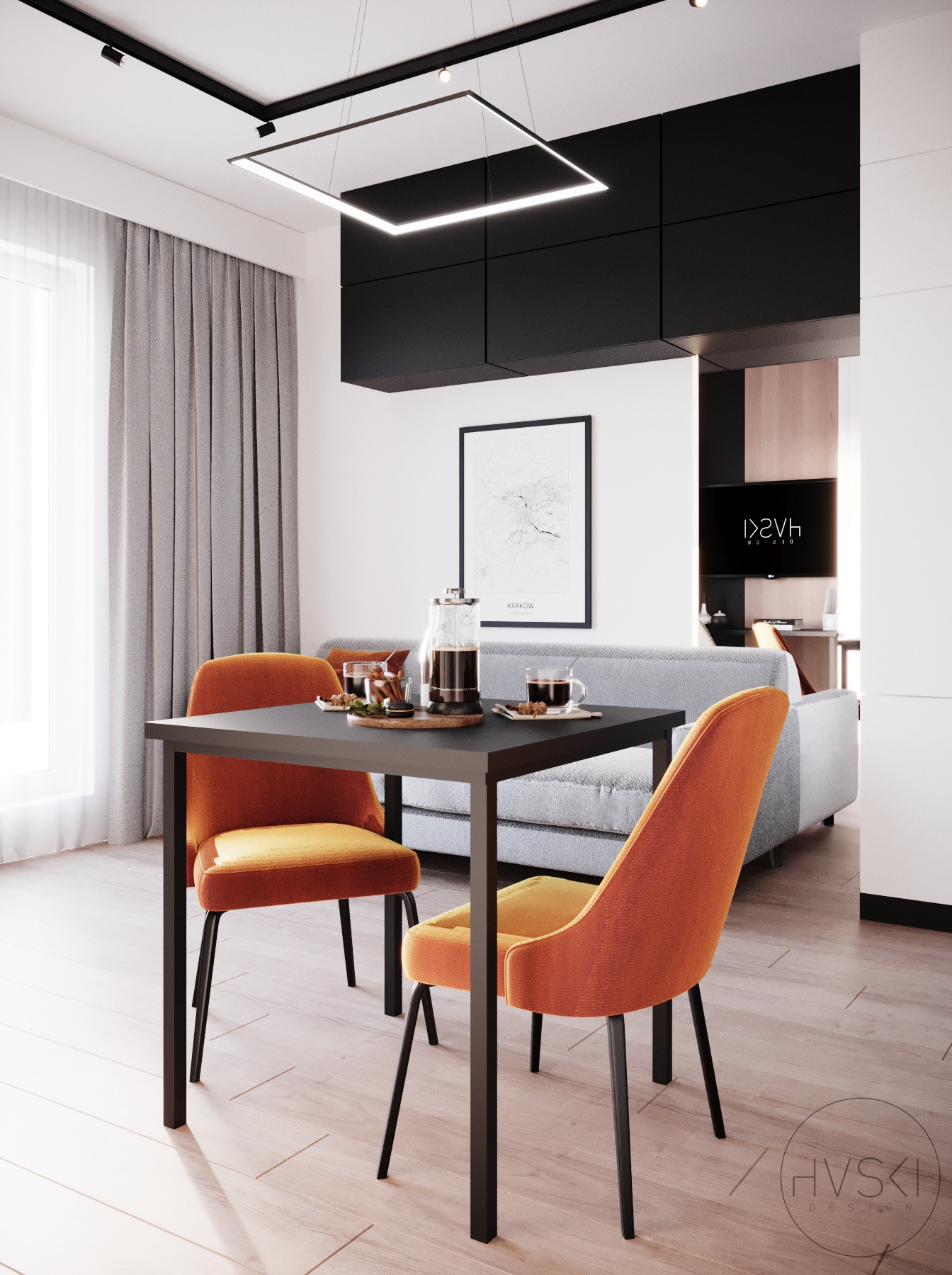 Nowoczesna jadalnia z czarnym stołem, pomarańczowymi krzesłami i szklanym dzbankiem do kawy na tle minimalistycznego salonu z szarą sofą i czarno-białą dekoracją ścienną z mapą Krakowa.