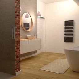 Projektowanie wnętrz Art Centrum Nieruchomości - Wizualizacja łazienki w stylu nowoczesnym z elementami loftowymi: kabina prysznicowa, umywalka nablatowa z okrągłym lustrem w drewnianej ramie, wolnostojąca wanna, grzejnik drabinkowy i ceglana...