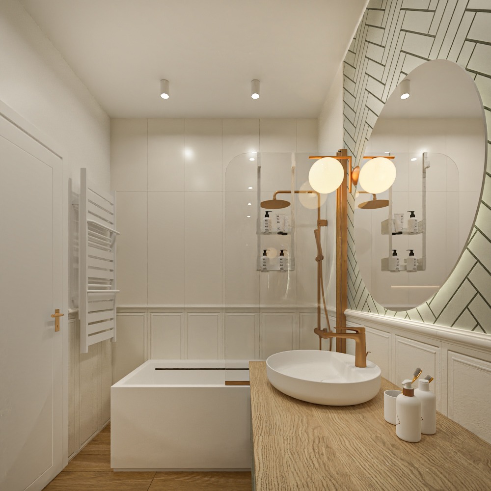 Jasna łazienka z owalnym lustrem w dekoracyjnej ramie, umywalką na drewnianym blacie, minimalistyczną wanną i złotą armaturą.