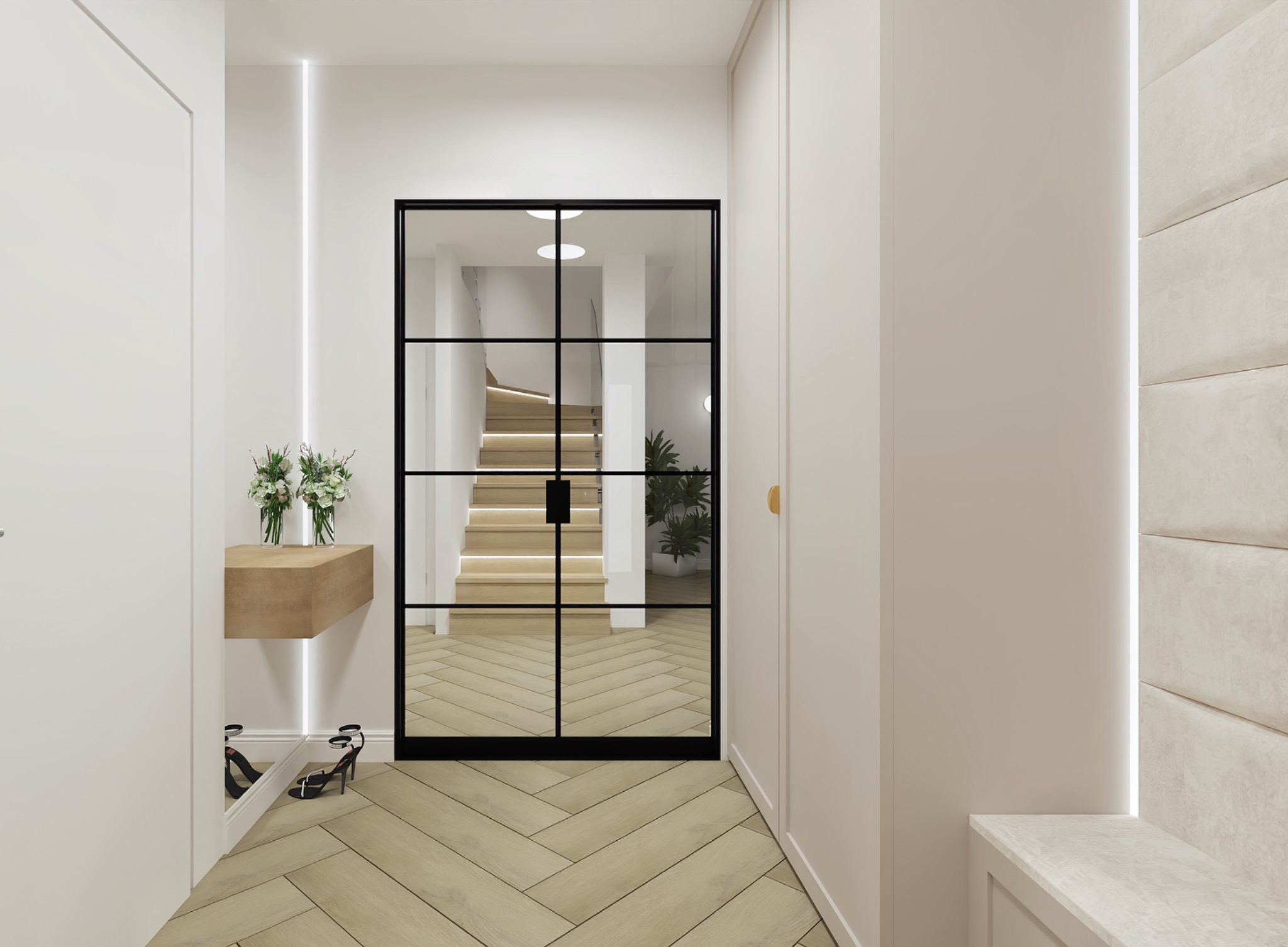 Wnętrze przedpokoju z podłogą w jodełkę, przeszklonymi drzwiami w czarnej ramie, przez które widać schody z podświetleniem LED, oraz drewnianą półką z kwiatami i parą szpilek pod spodem.