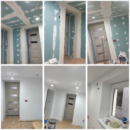 Szym-bud - Wnętrze w trakcie remontu: ściany i sufit z płyt kartonowo-gipsowych, częściowo wyszpachlowane, widoczne zaklejone taśmą zabezpieczającą ościeżnice drzwi, przygotowania do malowania.