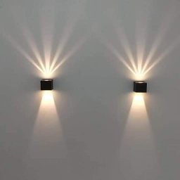 Jeszcze nie ma działalności - Dwa czarne, kwadratowe kinkiety ścienne emitujące promienie światła w górę i w dół na gładkiej, szarej ścianie.