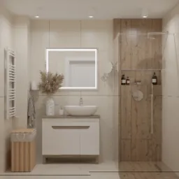 Jasna łazienka z umywalką nablatową, lustrem z podświetleniem LED, kabiną prysznicową typu walk-in z drewnianą okładziną oraz dekoracyjnym bukietem w wazonie.