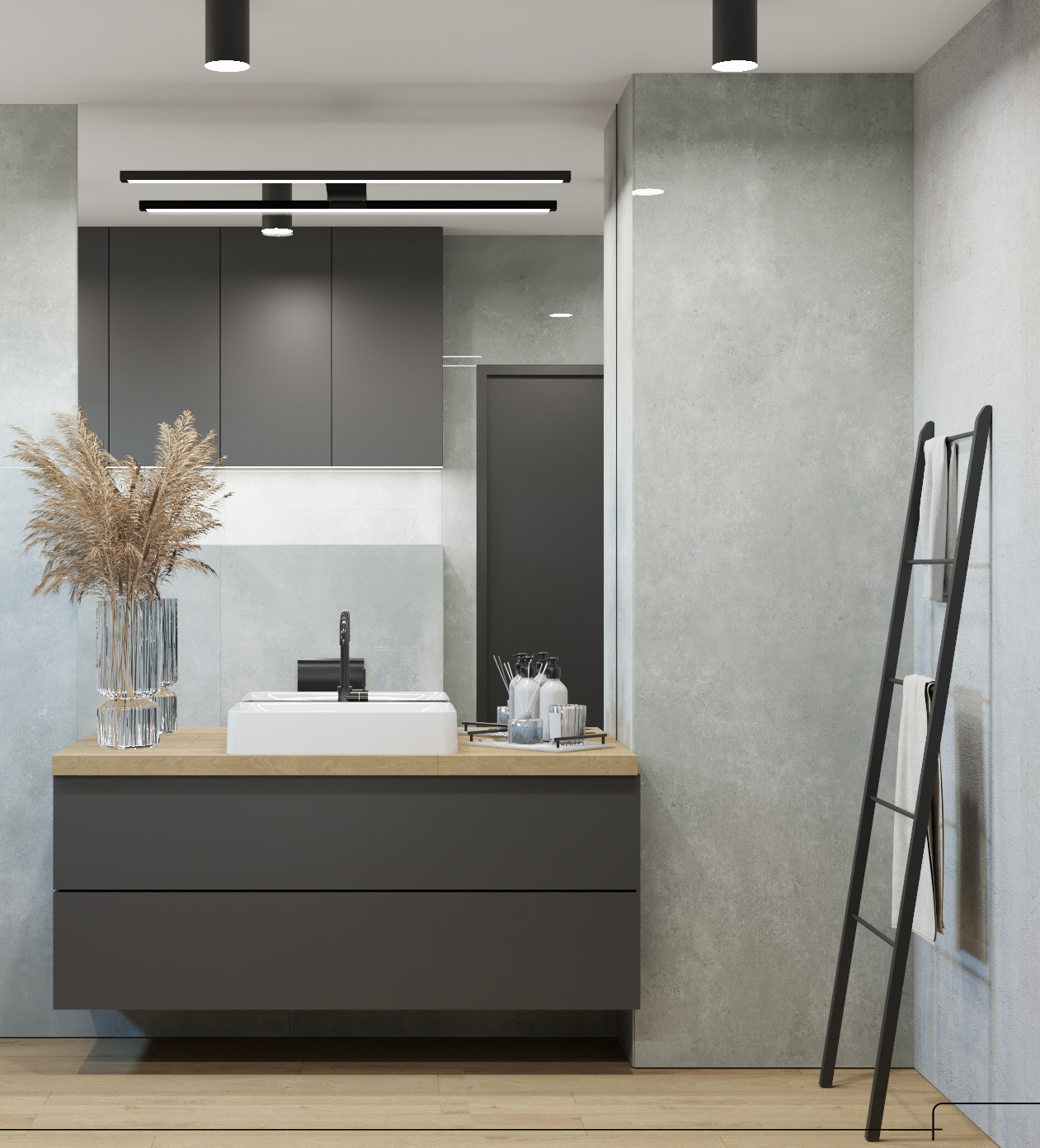 Nowoczesna łazienka z szarą szafką pod umywalką, drewnianym blatem, białym prostokątnym zlewem, czarną armaturą, dekoracyjną trawą pampasową w szklanym wazonie i drabinką na ręczniki