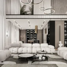 Jasny salon w nowoczesnym stylu z modułową sofą, okrągłymi lampami wiszącymi i dekoracyjną ścianą z motywem palm