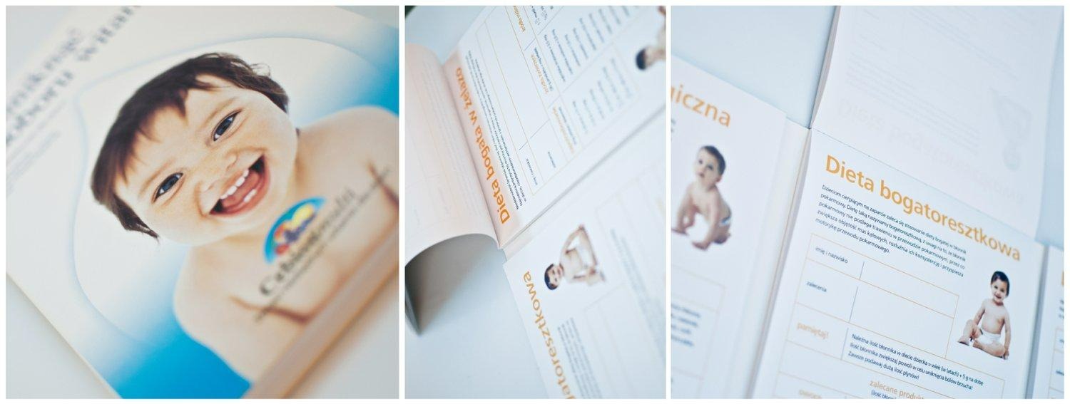 Otwarty katalog z ilustracjami i tekstem dotyczącym diety dla dzieci bogatej w błonnik, z wyraźnym zdjęciem uśmiechniętego niemowlęcia na okładce i stronach wewnętrznych.
