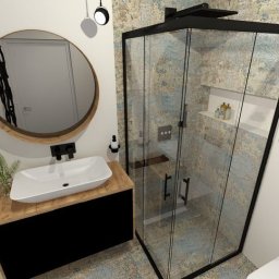 Agmima design sp. z o.o. - Wizualizacja łazienki z kabiną prysznicową w czarnej ramie, okrągłym lustrem z drewnianą obwódką nad umywalką nablatową na szafce z drewnianym blatem i rośliną w szklanym wazonie, oraz półkami...