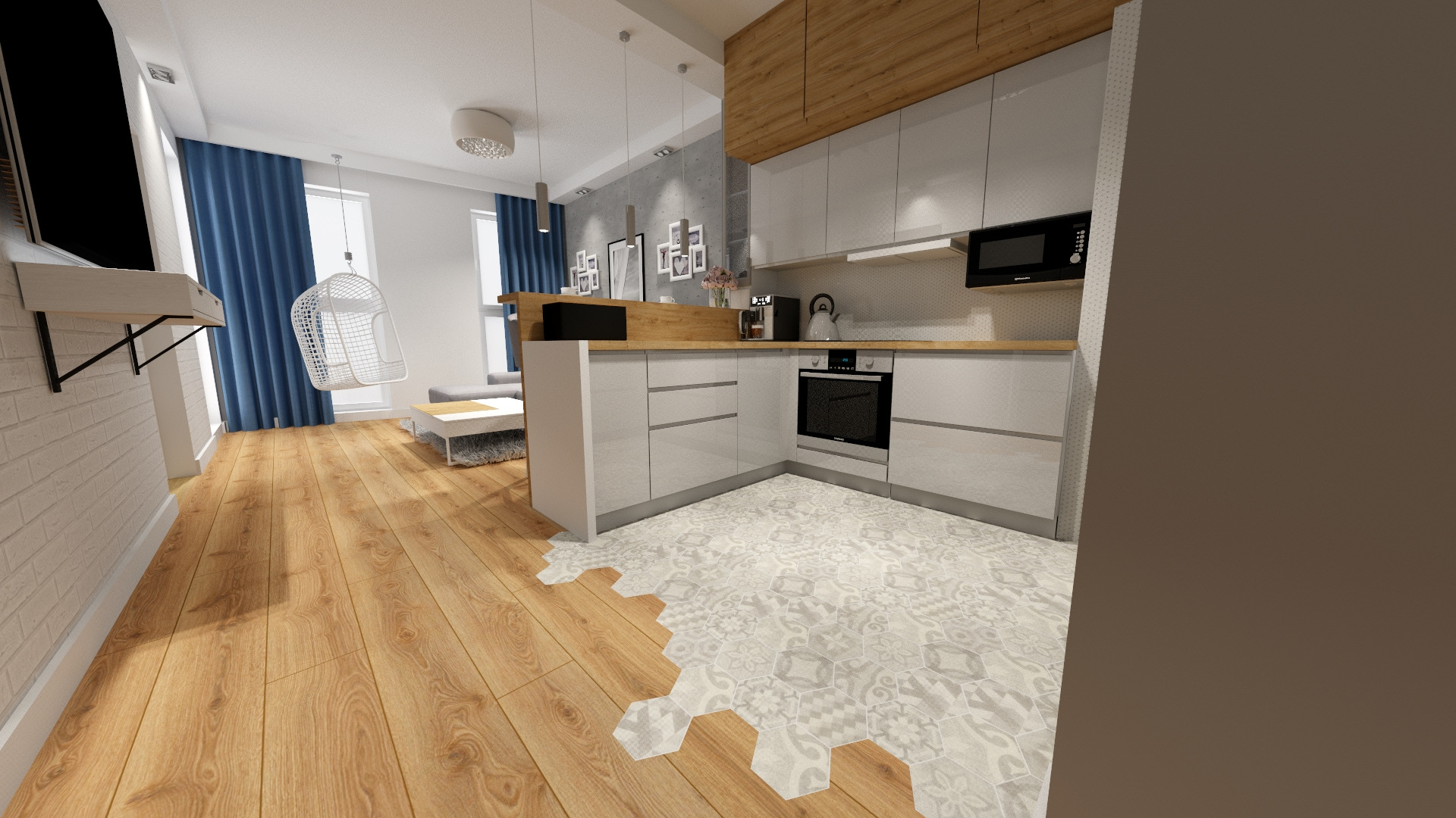 Nowoczesne wnętrze mieszkania z otwartą kuchnią, drewnianą podłogą przechodzącą w heksagonalne płytki, szare meble kuchenne i wiszące krzesło.