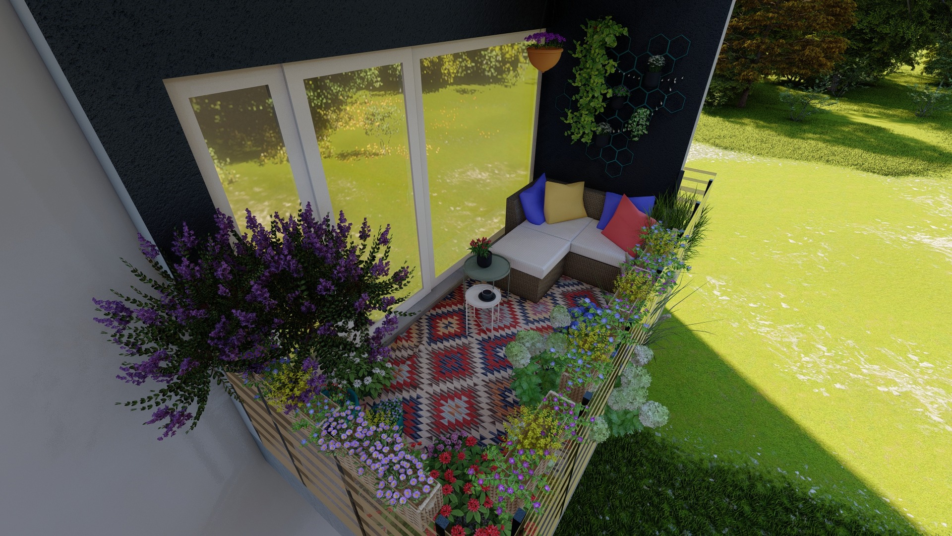 Kompaktowy balkon w Ględowie, z narożną sofą z rattanu, kolorowymi poduszkami, wzorzystym dywanem i obfitymi nasadzeniami kwiatów w donicach na balustradzie, widok z góry.