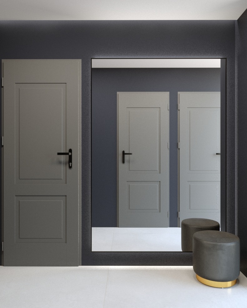 Szare drzwi z czarną klamką obok lustra z podświetleniem LED, w którym odbijają się kolejne drzwi i dwa szare pufy z złotą podstawą, na białej podłodze.