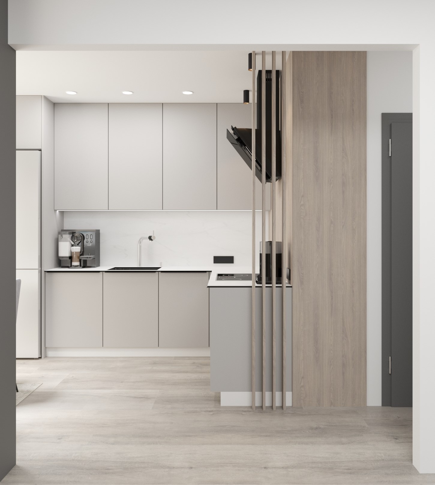 Nowoczesna kuchnia w odcieniach szarości i beżu z drewnianą ścianką działową, ekspres do kawy na blacie, minimalistyczny okap i płyta indukcyjna.