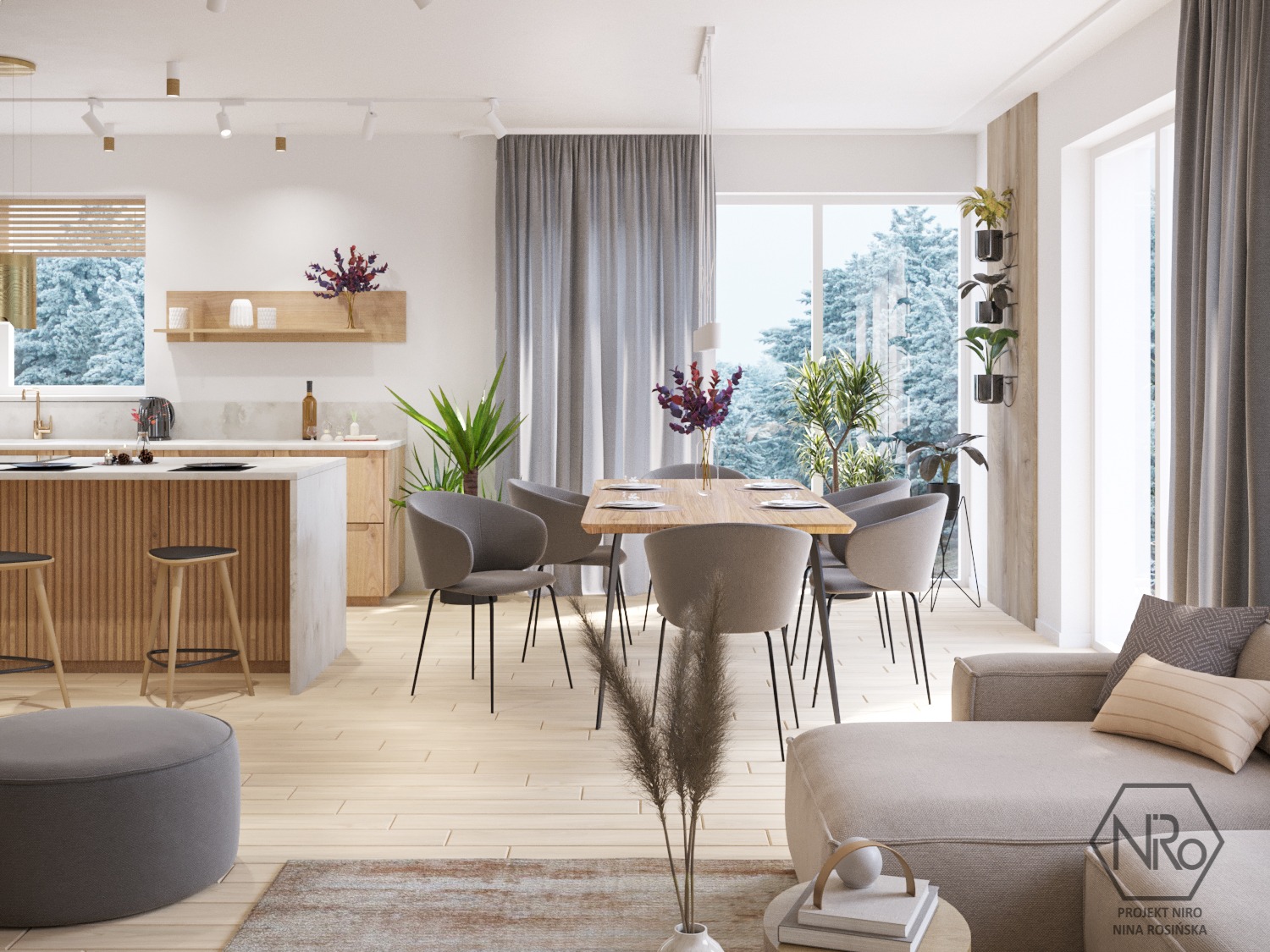 Jasne, przestronne wnętrze: kuchnia z wyspą, jadalnia ze stołem i krzesłami oraz salon z beżową sofą. Za oknem widok na zimowy las. Minimalistyczny wystrój z drewnianymi akcentami i szarymi...