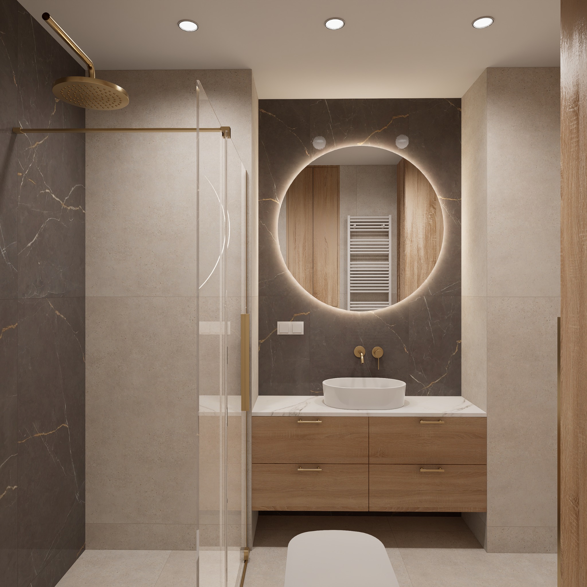 Nowoczesna łazienka z okrągłym lustrem podświetlanym LED, brązowymi płytkami imitującymi marmur i drewnianą szafką. Kabina prysznicowa ze złotymi elementami.