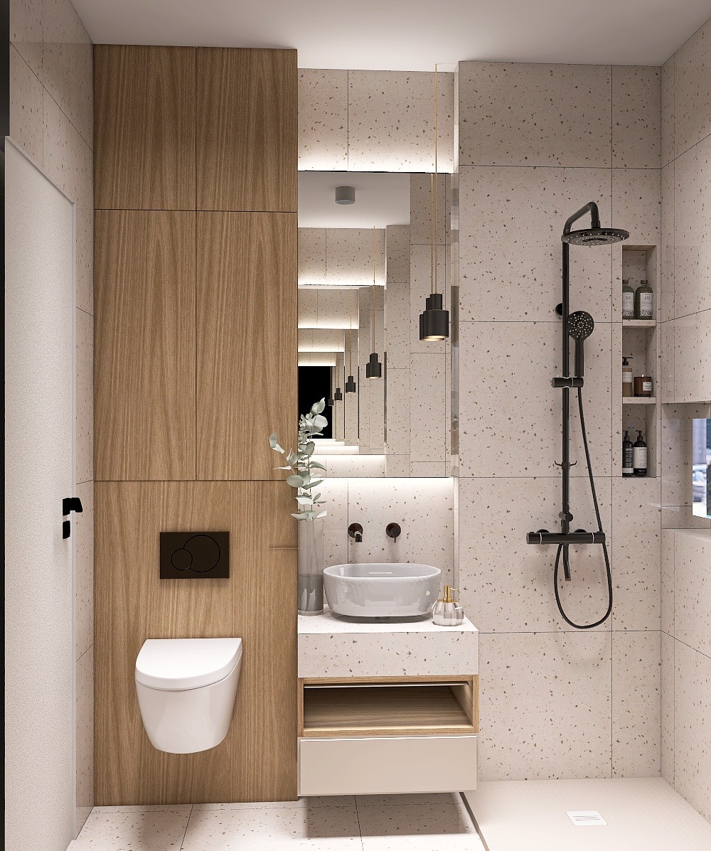 Nowoczesna łazienka z drewnianą szafką, wiszącą toaletą i umywalką na blacie z terazzo. Czarna armatura i oświetlenie LED podkreślają minimalistyczny design.