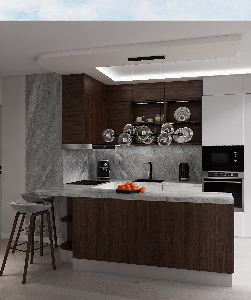 Nowoczesna kuchnia z marmurową ścianą, drewnianymi szafkami i wyspą z blatem. Nad wyspą wisi designerska lampa z szklanymi kulami. Na blacie leżą pomarańcze.