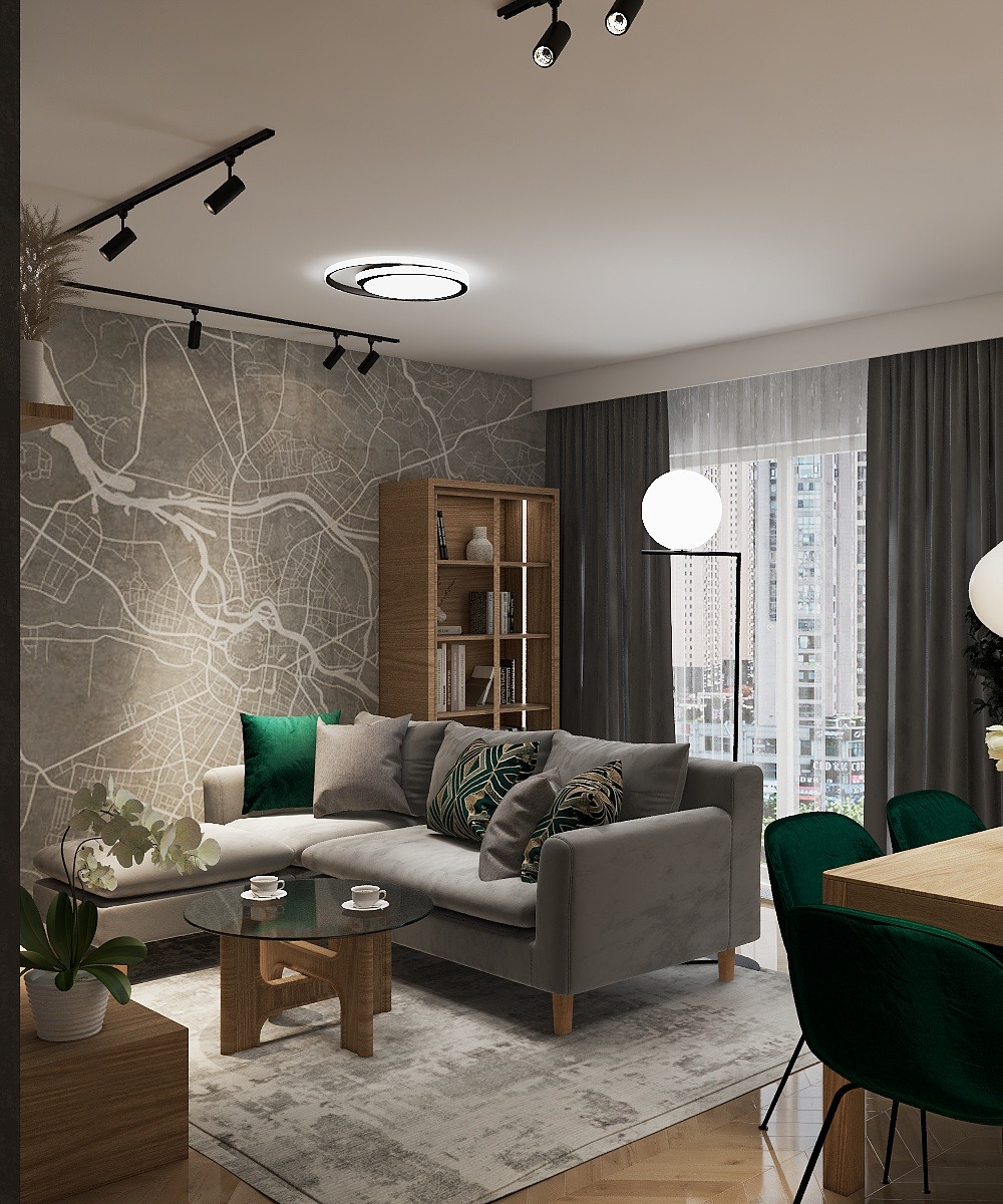 Nowoczesny salon z szarą sofą narożną, okrągłym stolikiem kawowym i ścianą z mapą. Minimalistyczne oświetlenie sufitowe i zielone akcenty dodają elegancji.