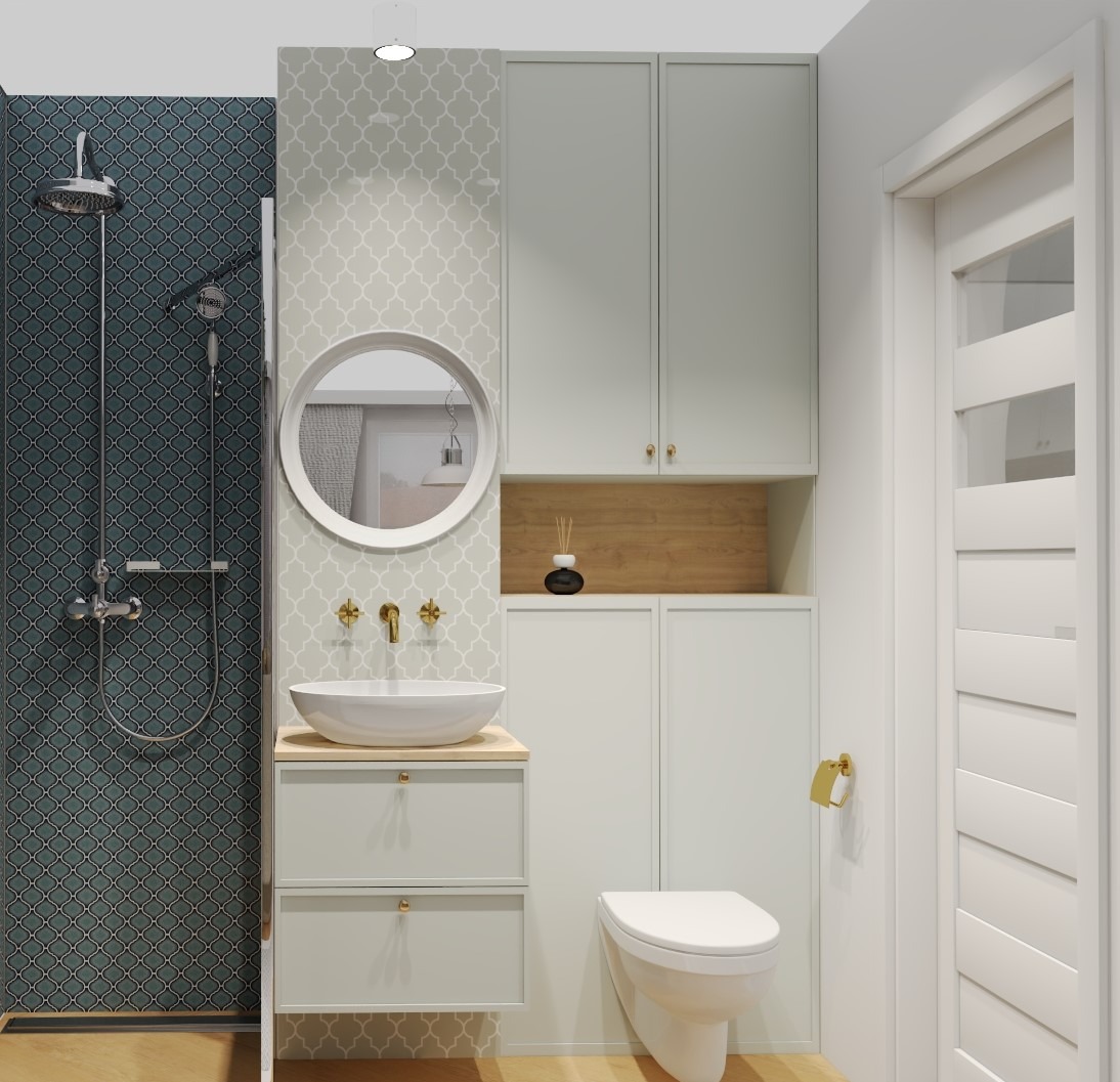 Wizualizacja łazienki z kabiną prysznicową wyłożoną ciemną mozaiką, okrągłym lustrem nad umywalką, białymi szafkami i toaletą wiszącą, całość utrzymana w jasnej kolorystyce.
