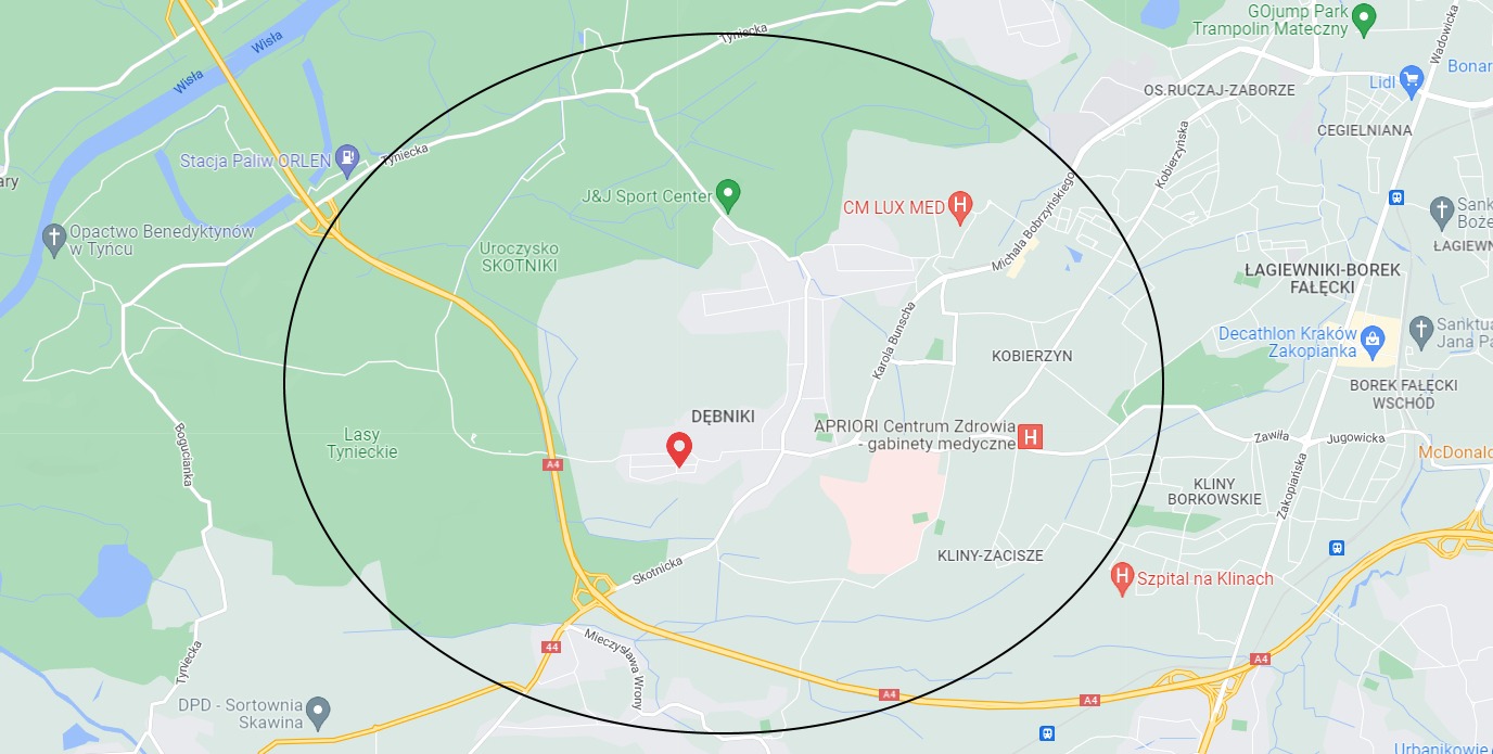 Mapa Krakowa z zaznaczonym okręgiem obejmującym Dębniki, Łagiewniki-Borek Fałęcki, Las Tyniecki i fragment Skawiny, widoczne punkty orientacyjne jak Stacja Paliw Orlen, Opactwo Benedyktynów w Tyńcu...