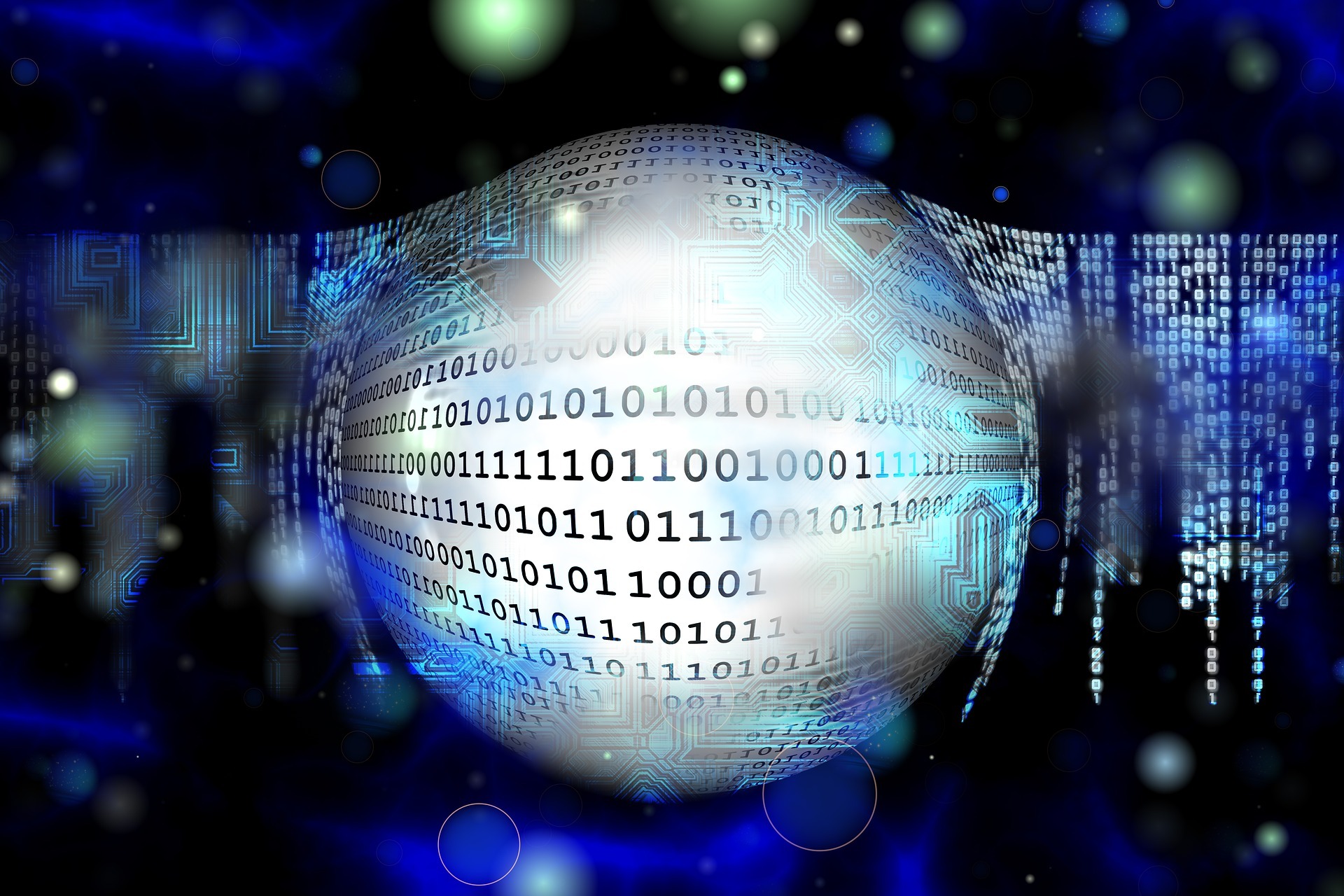 Abstrakcyjna kula otoczona binarnym kodem i elementami płyty głównej, symbolizująca cyfrowy świat i przetwarzanie danych.