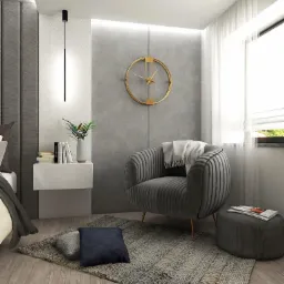 Nowoczesny kącik wypoczynkowy z szarym fotelem, pledem, pufem z magazynem, dywanem i dekoracyjnym zegarem na ścianie.