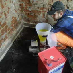 Osuszanie pomieszczeń piwnicznych wraz z wykonaniem hydroizolacji.