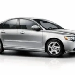 Srebrny samochód osobowy marki Volvo, model S40, na białym tle z delikatnym odbiciem.